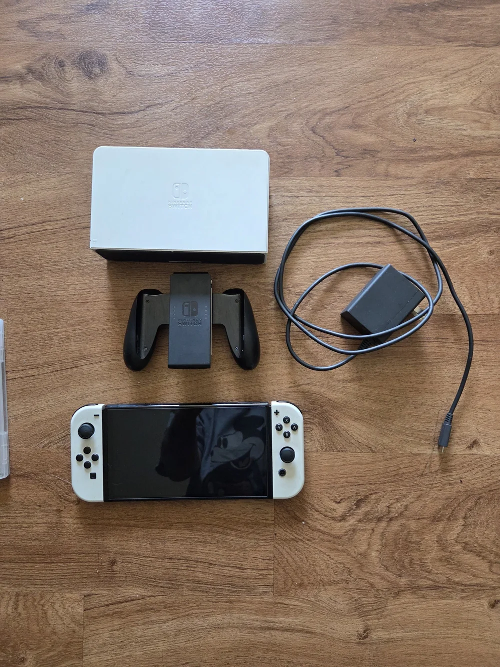 Nintendo Switch with White Joy‑Con Panels and Black Back